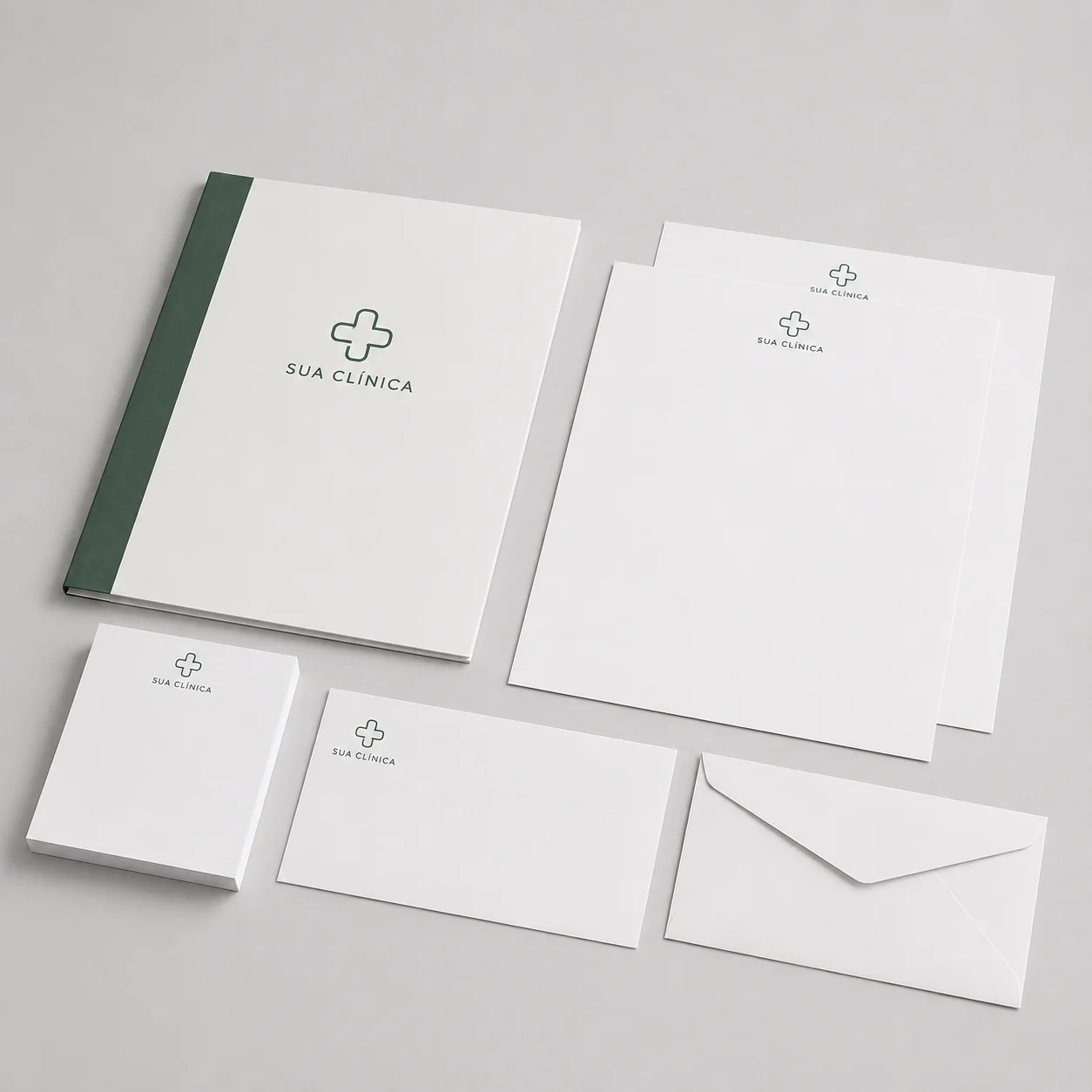 Pasta, envelope e folhas personalizados para clínica médica
